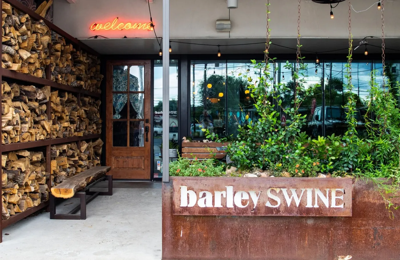 The Barley Swine entrance surrounded by greenery