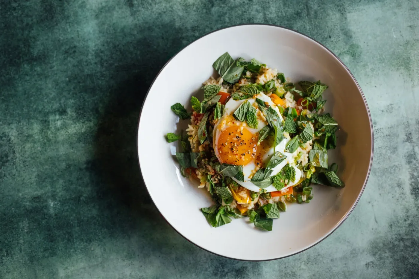 Plated green salad dish with egg. Tillie's.