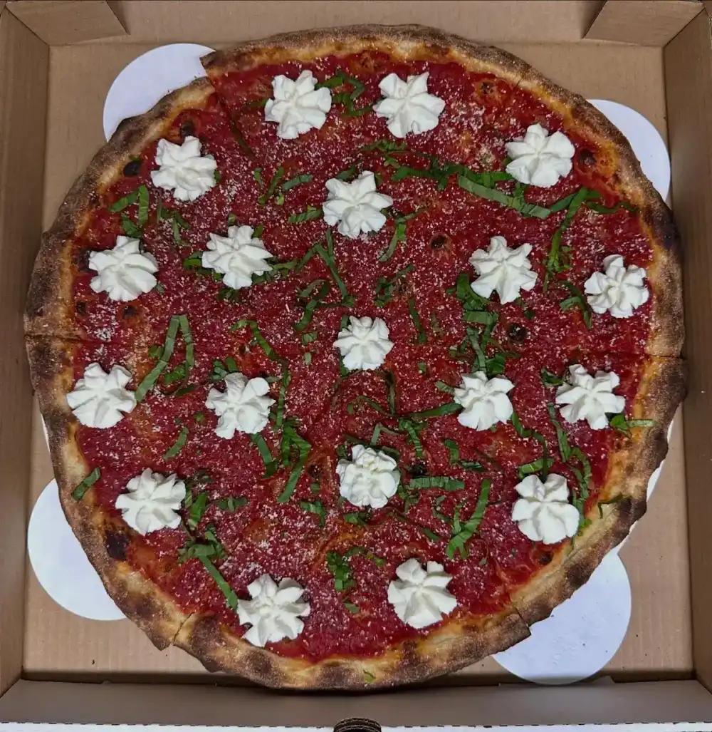 Restaurant or food photograph published by Feral Pizza