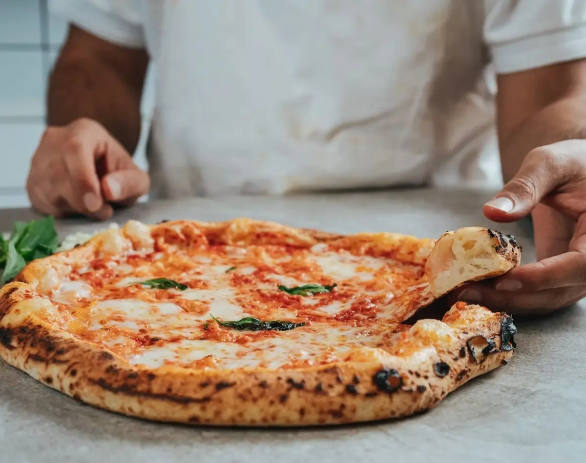 Restaurant or food photograph published by Pizza Tova