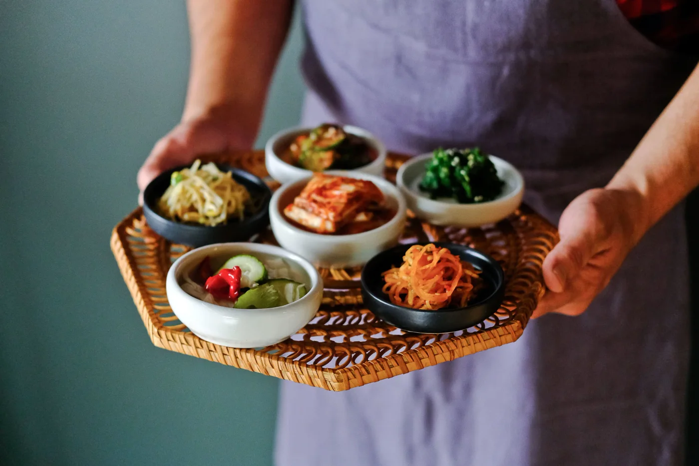 Korean dishes served on a tray at Oseyo